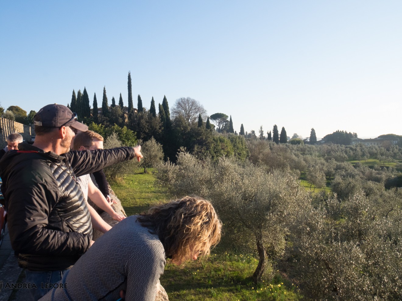 a man and a woman taking a selfie in a field