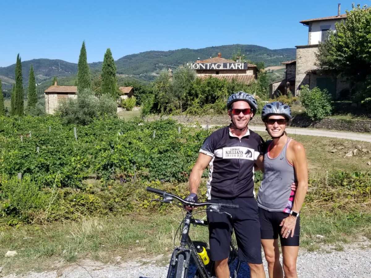 two people with bike in Montagliari