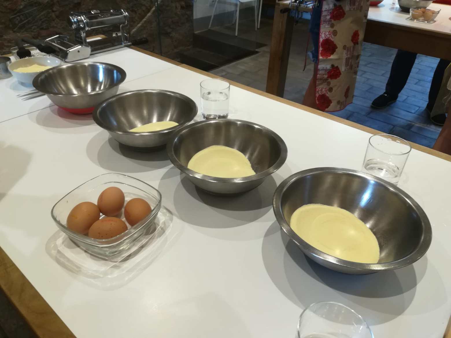 pasta dough on table with eggs