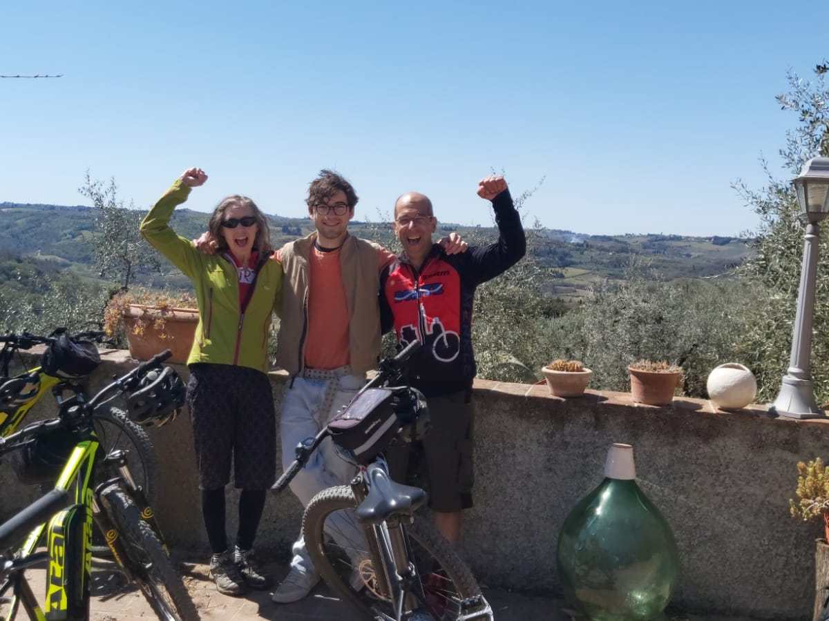 a person standing next to a bicycle