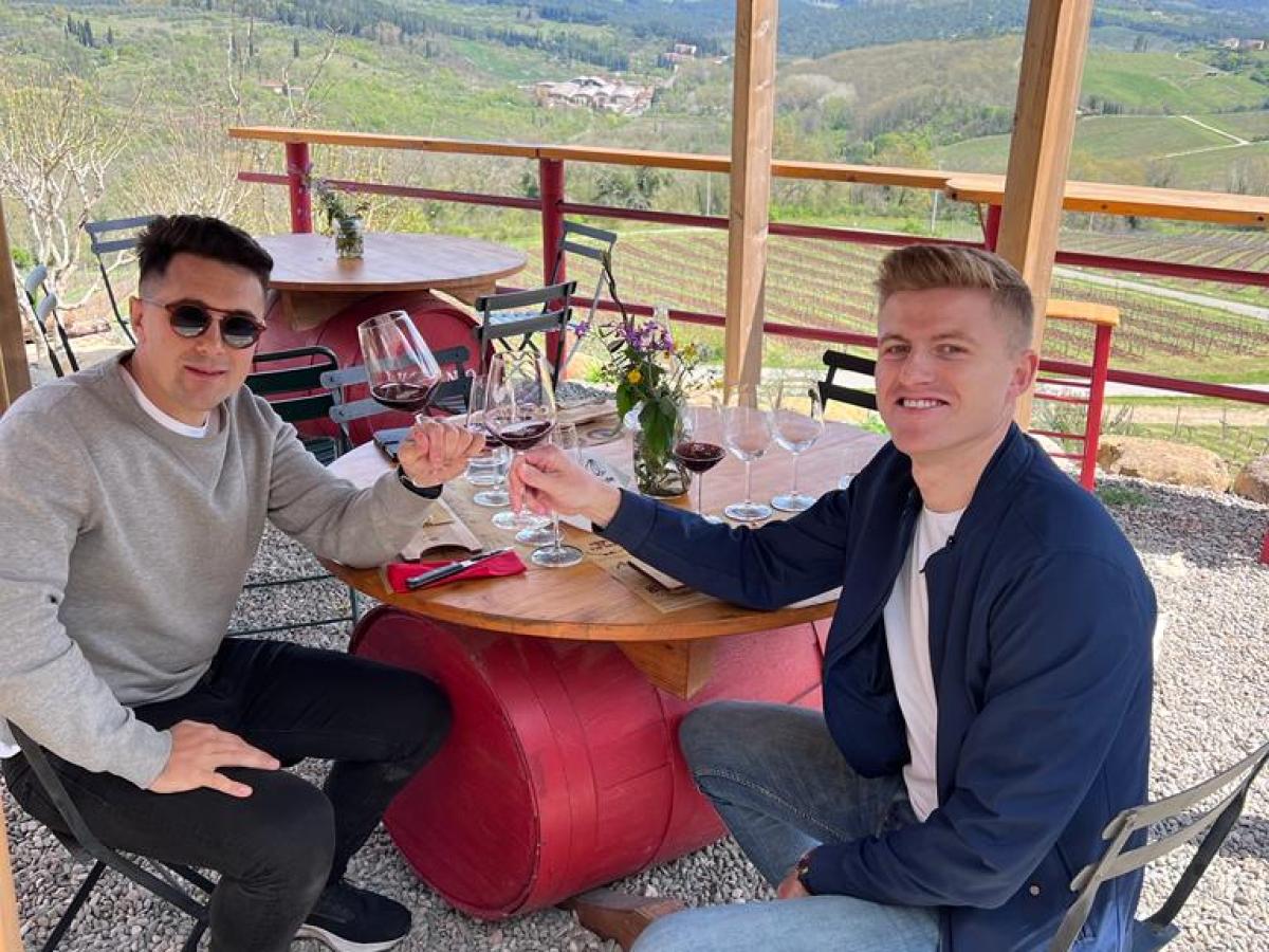 a group of people sitting on a bench