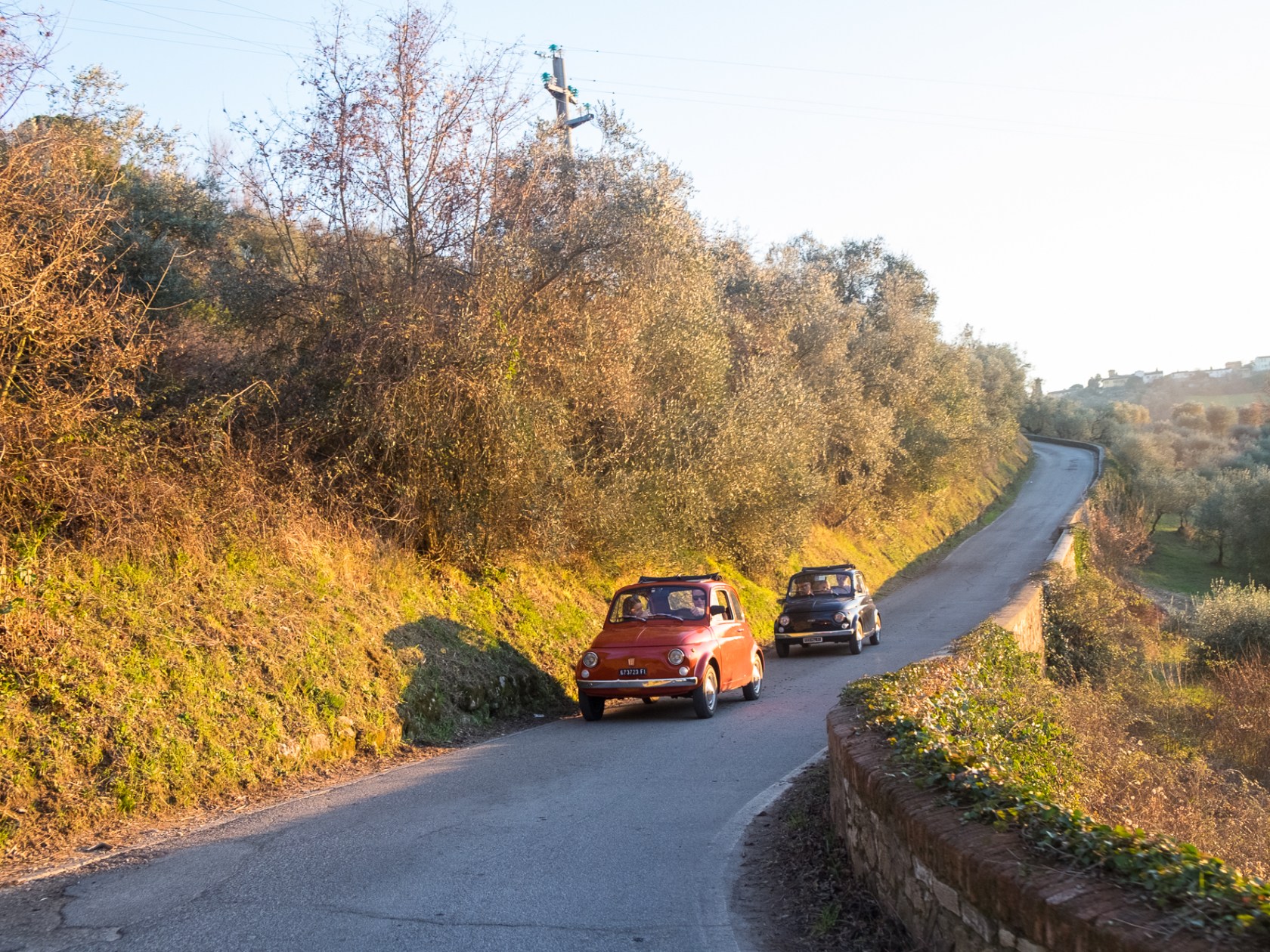 a car driving down a country road